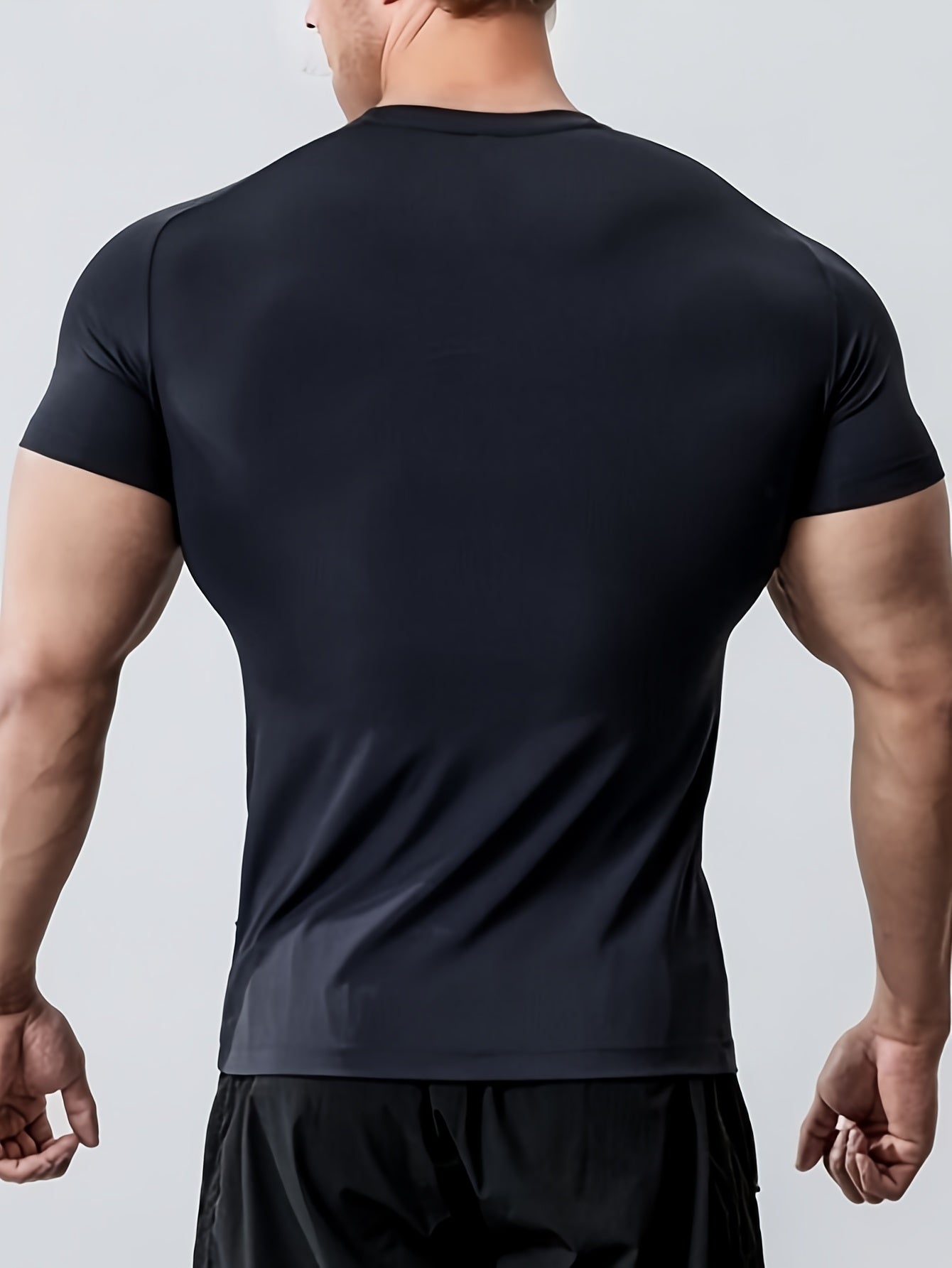 Camiseta de manga corta de poliéster de corte ajustado para hombre, cuello redondo, ideal para actividades al aire libre en verano