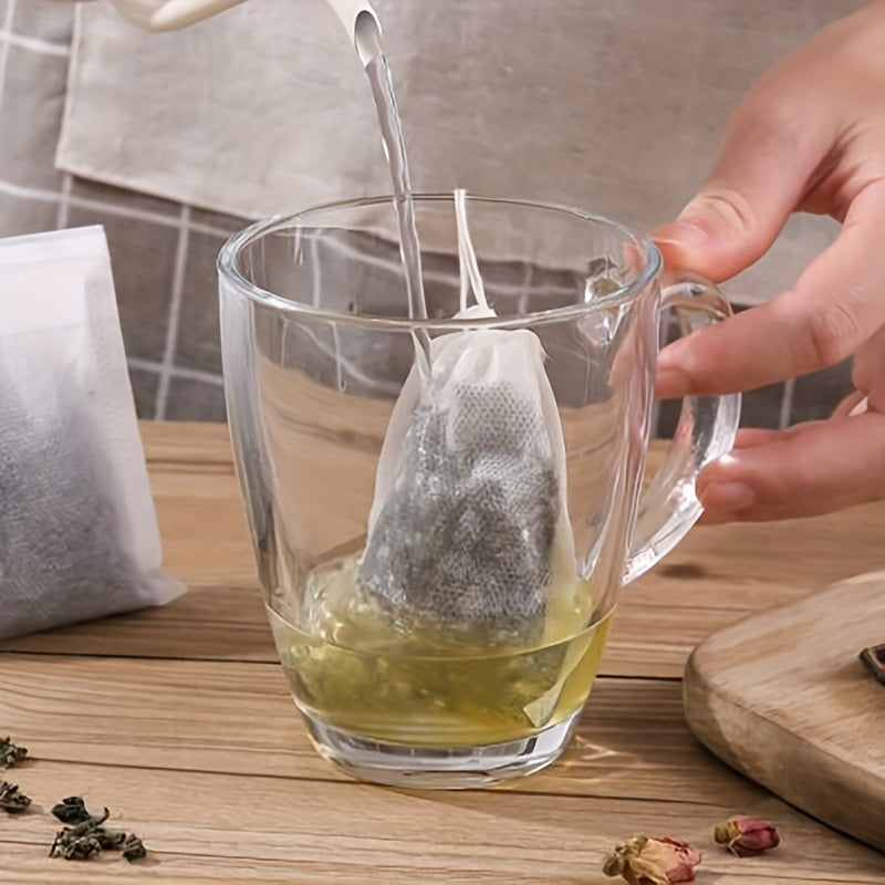 100 ta Bir martalik ishlatiladigan to'rva bo'lmagan filtr sumkalar, choy, o'tlar, ziravorlar va efir moylari uchun