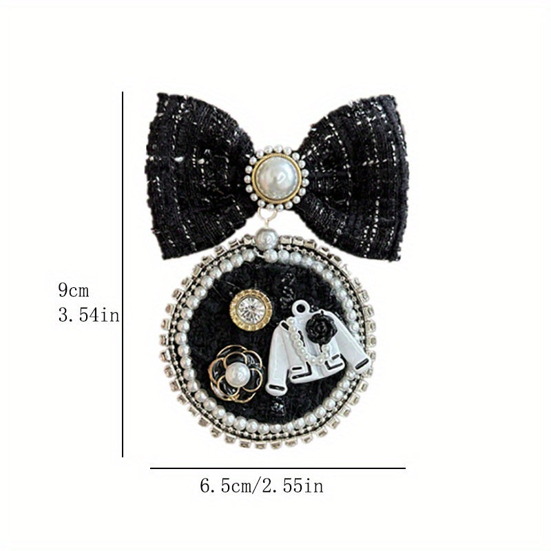 Broche de lazo negro con perlas falsas para la moda femenina