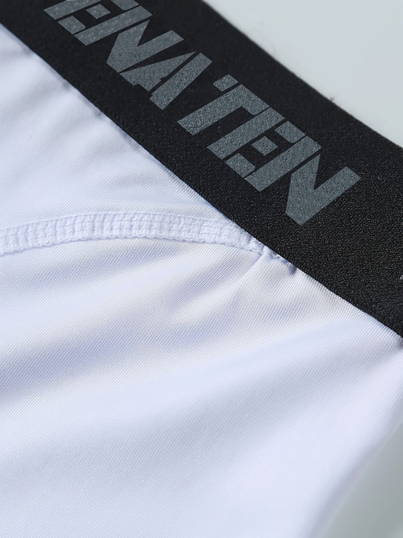 Basketbol, yugurish va sport zalidagi mashg'ulotlar uchun erkaklar uchun siqish shimlari.