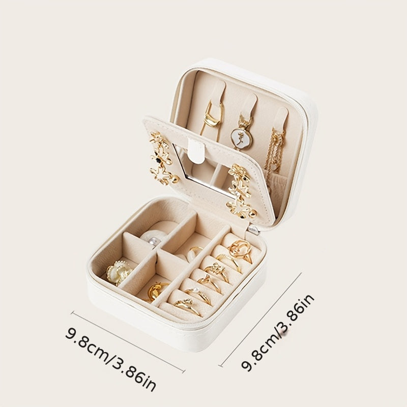 Organizador portátil de joyas con espejo, cubierta con cremallera y apertura abatible para anillos, pendientes y collares