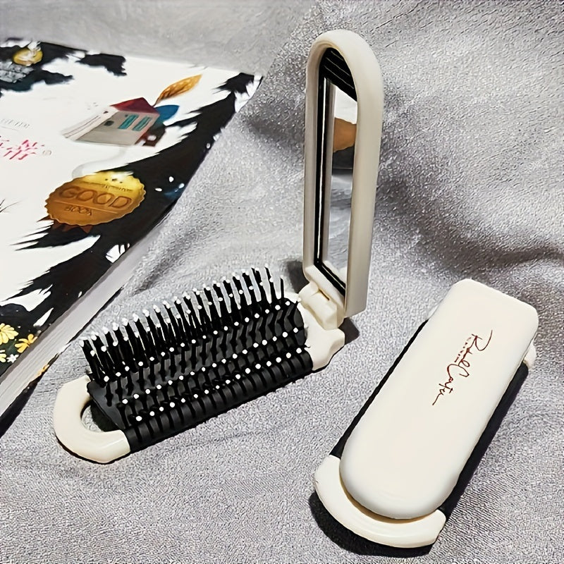 Cepillo de pelo plegable de tamaño de viaje con cerdas antiestáticas y espejo para todo tipo de cabello