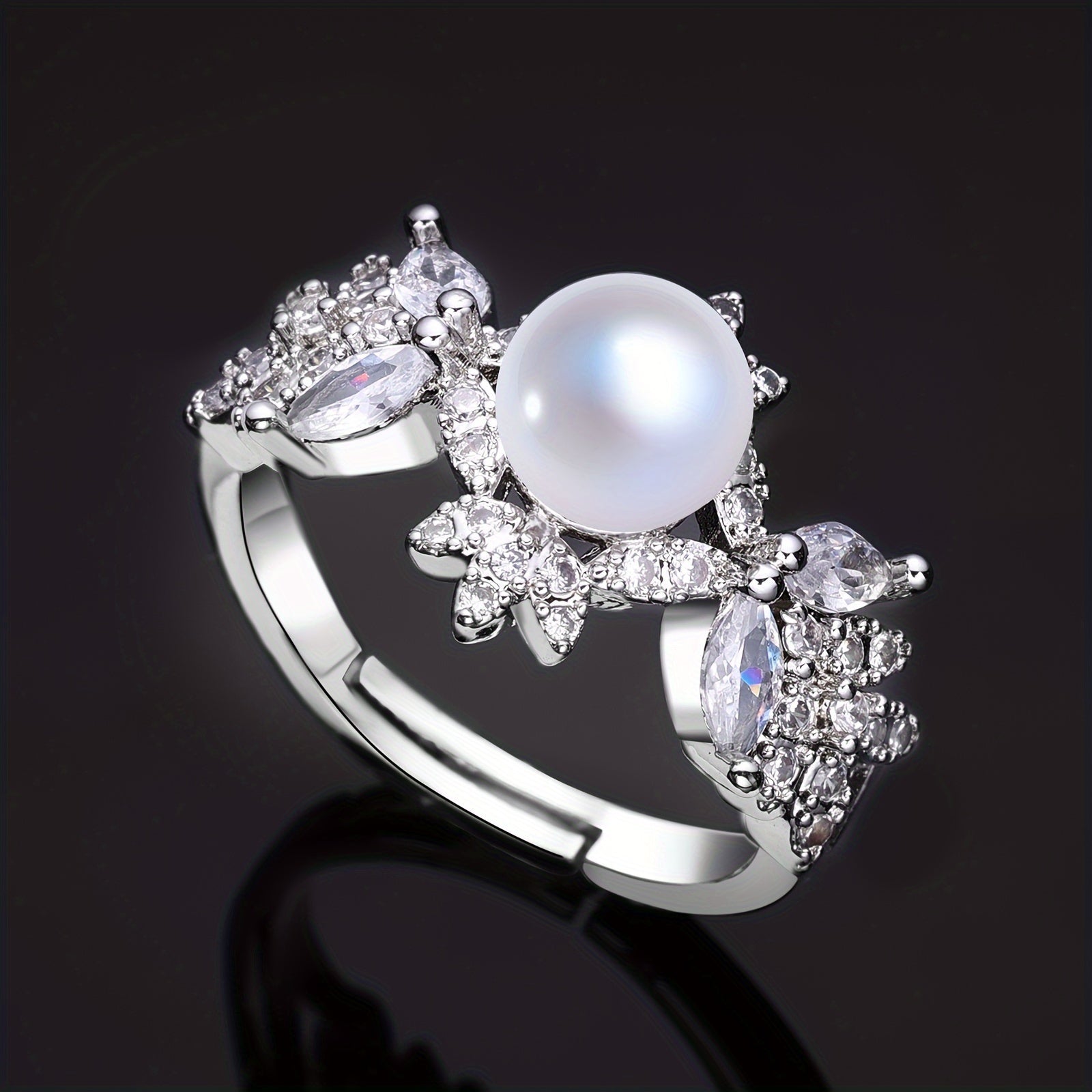 Ayollar uchun nozik to'y zargarlik to'plami, maxsus kuningizda hashamatli tuyg'u berish uchun yuqori sifatli kubik zirkoniya va sun'iy marvaridlarni o'z ichiga oladi.