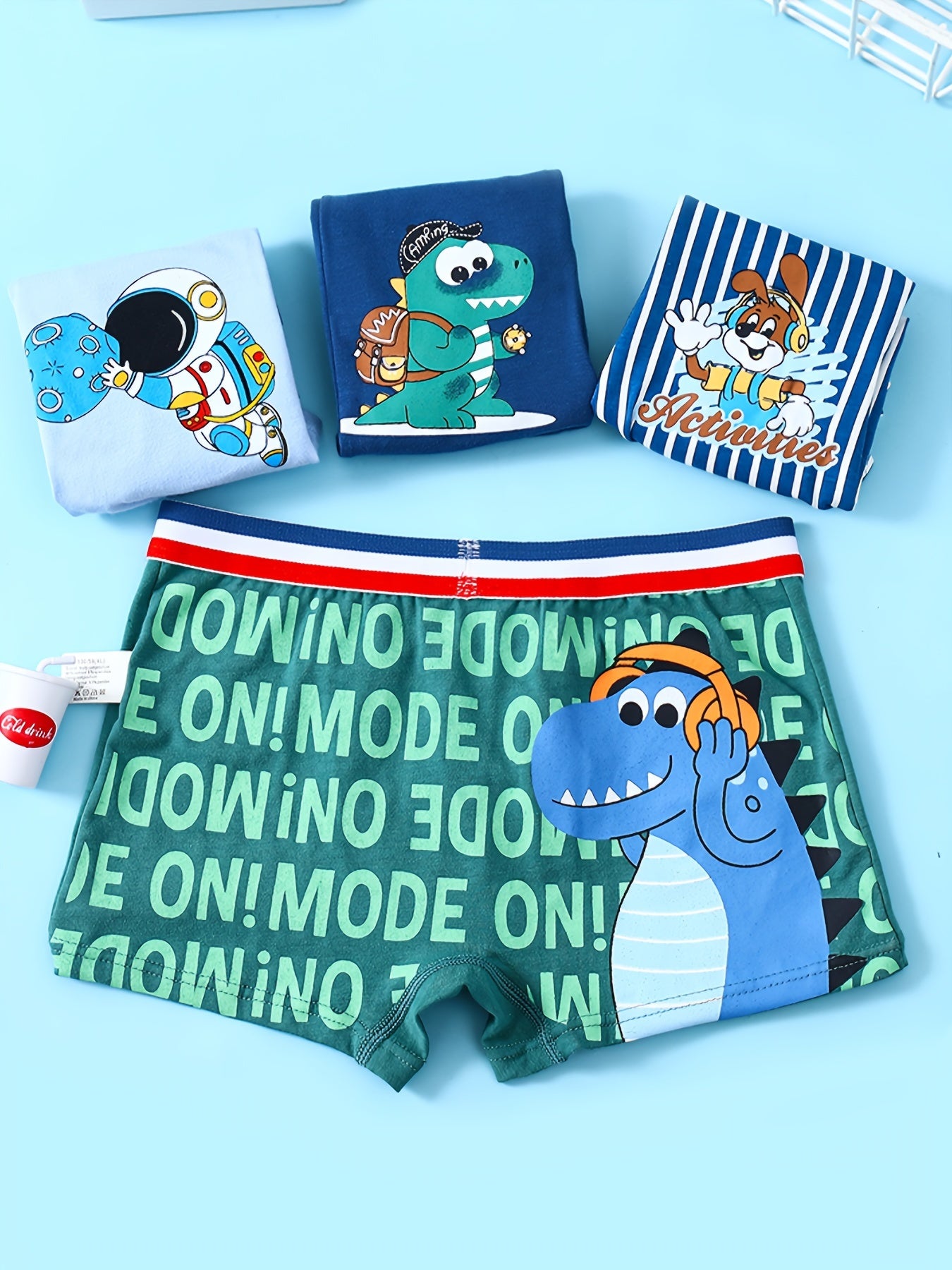 Conjunto de 4 calzoncillos bóxer de algodón para niños con estampados de astronauta y dinosaurio, transpirables, elásticos y aptos para todas las estaciones