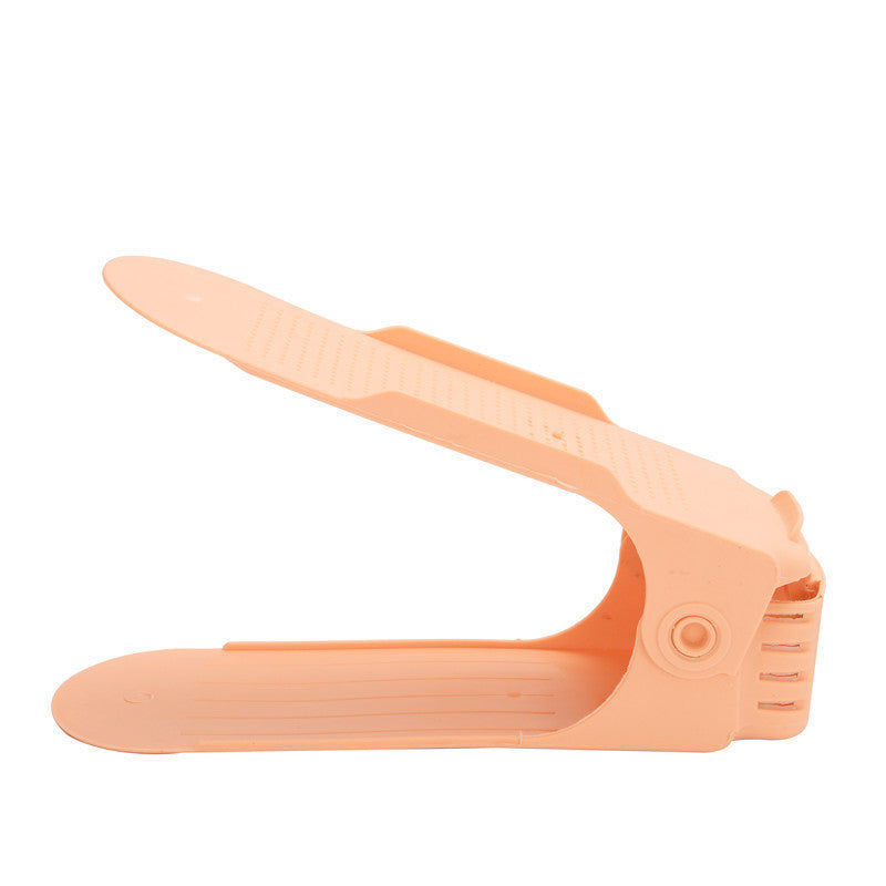 Регулируемая двухуровневая полка для обуви — эффективное решение для экономии места при хранении тапочек и обуви, идеально подходит для организации пространства дома и в общежитии.