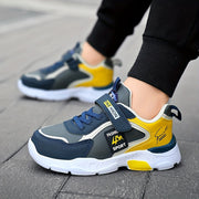 Мужские дышащие спортивные туфли с застежкой на липучке, нескользящей подошвой и повседневным беговым стилем в синем/желтом/белом цвете для всех сезонов.