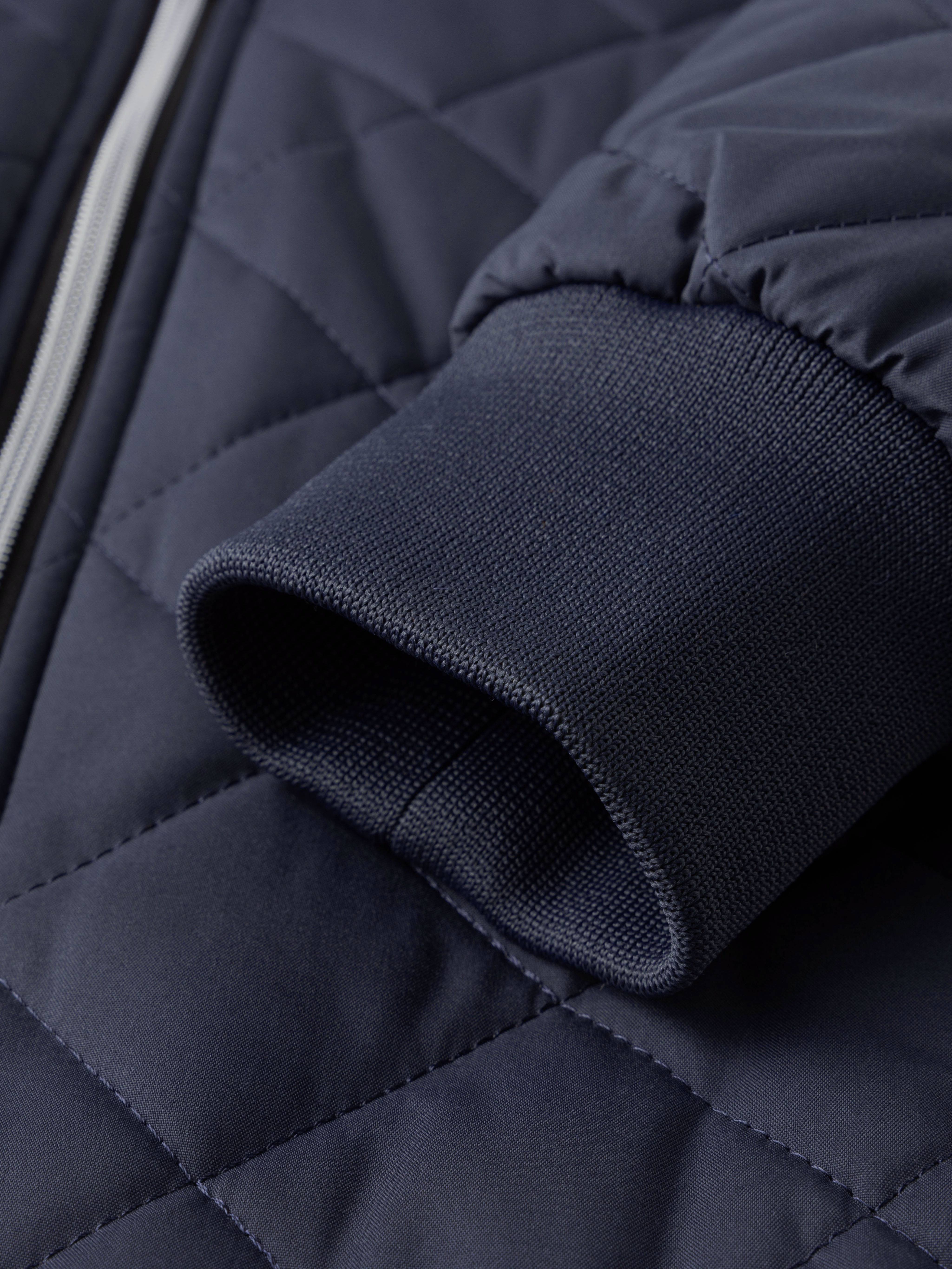 Chaqueta de invierno acolchada para hombre con forro de felpa en verde oscuro, cuello alto y cremallera