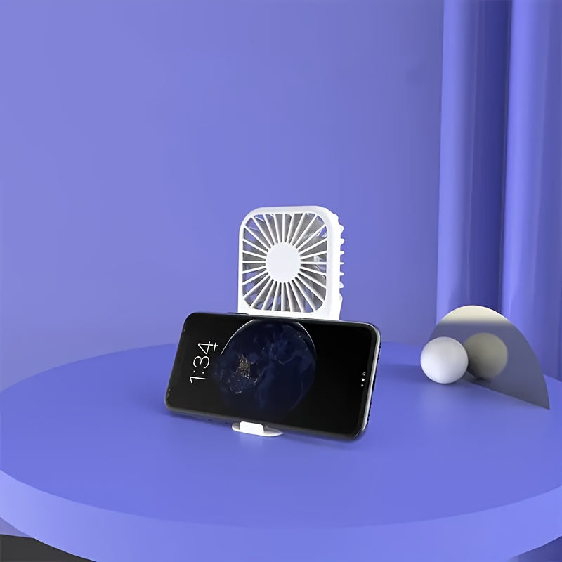 Portable Handheld Fan with USB Rechargeable Stand for Travel and Outdoor Use