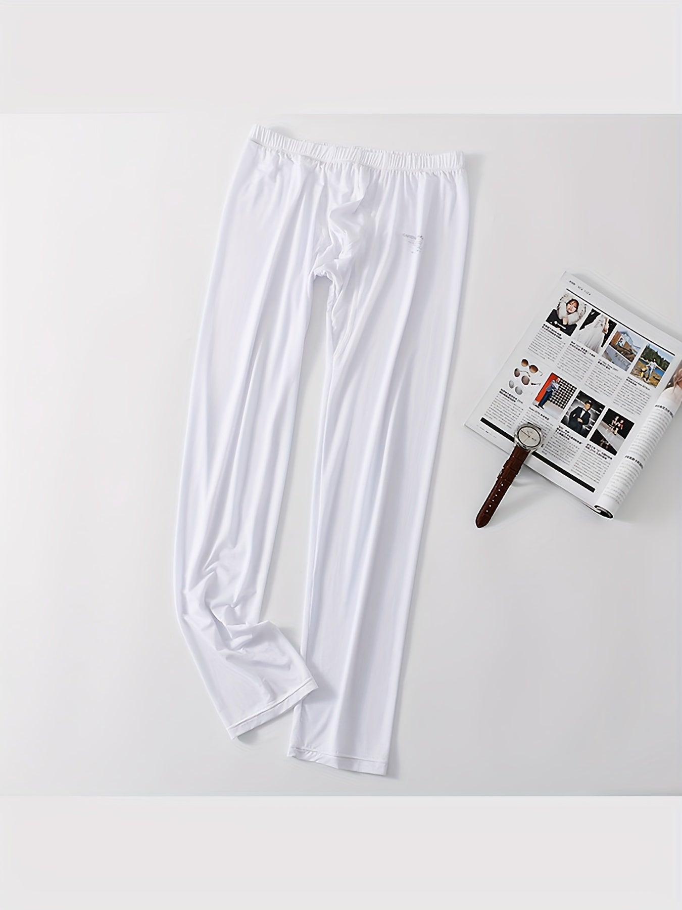 KAREN SPACE Erkaklar uchun Qora Rangdagi Muz Silky Siqish Legginglari. Tez quriydigan, cho'ziluvchan va yuqori elastik Spandex/Nylon aralashmasi bilan mashinada yuvish mumkin. Quvvat va mos keladigan qulaylik uchun silliq mato.