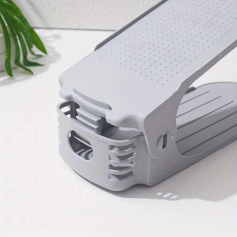 Estante para zapatos de doble capa ajustable y plegable, gris y negro, para almacenamiento de flats y zapatillas