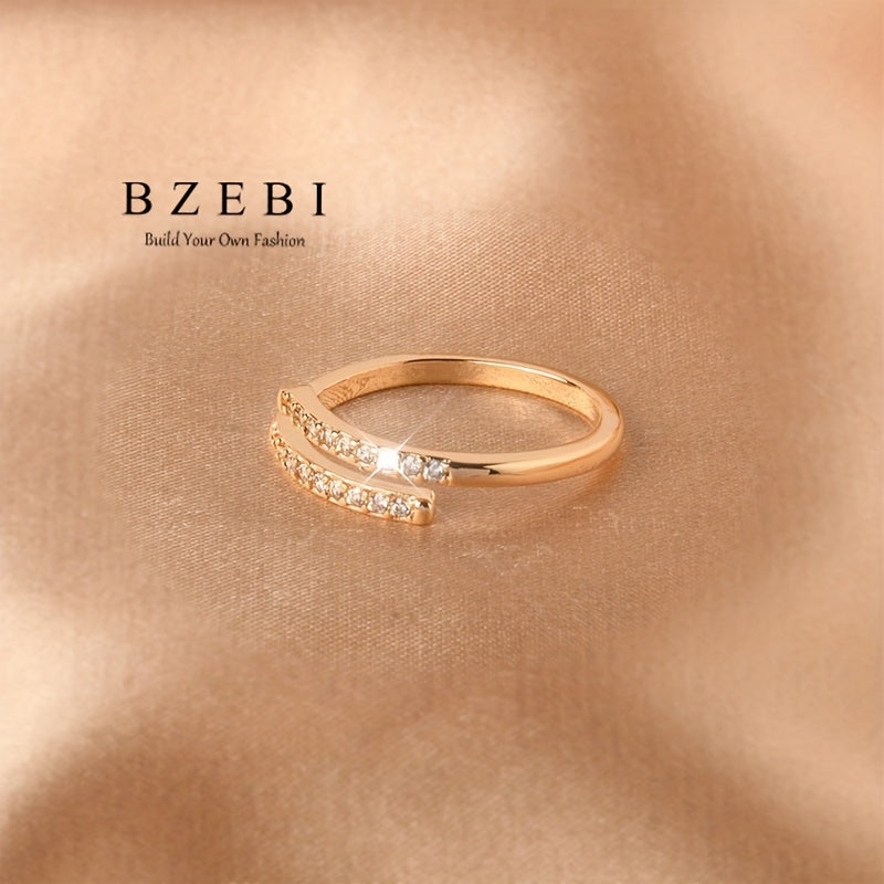 Anillo cruzado ajustable con circonia cúbica en oro de 18K para piel sensible