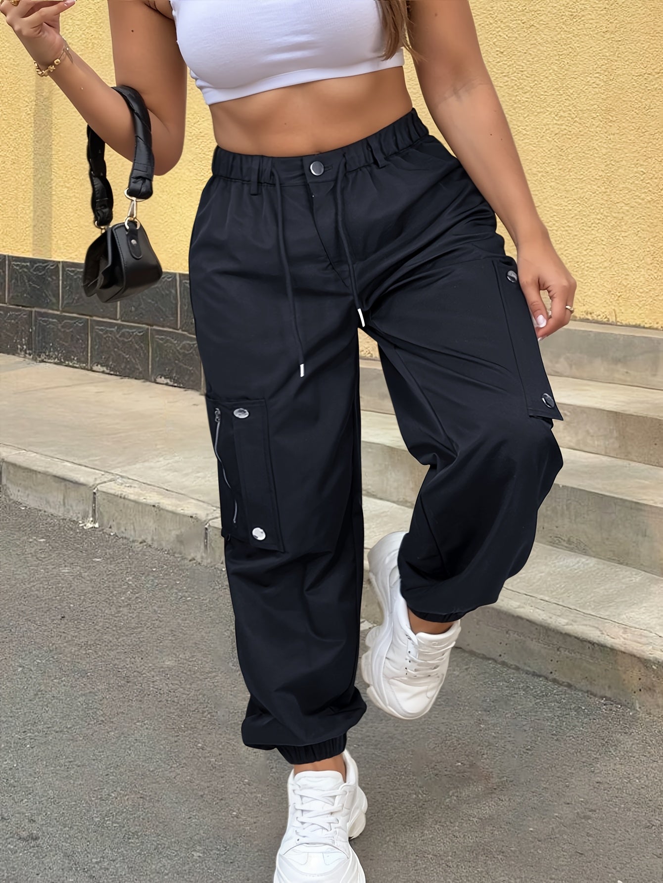 Ayollar uchun keng model polyester joggerlar, cho'ntaklar bilan, barcha mavsum uchun kundalik shimlar