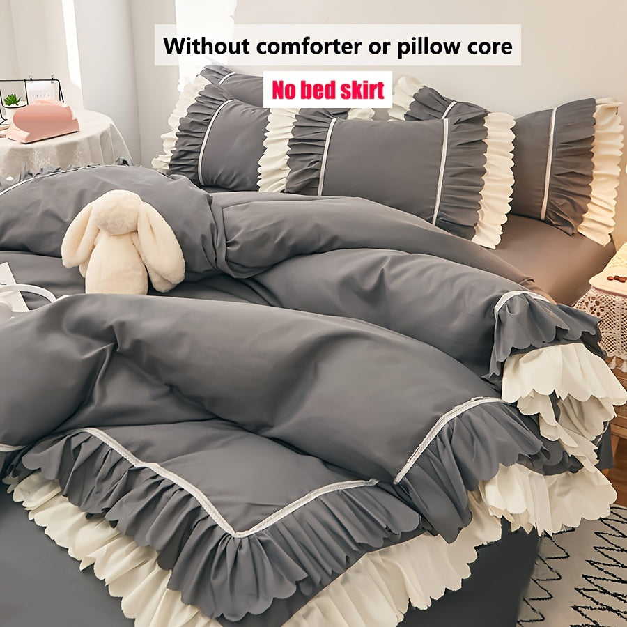 3 qismdan iborat pushti qirralangan to'shak to'plami 2 ta yostiq qopqog'i va 1 ta qopqoqni o'z ichiga oladi, to'ldiruvchi yoki qulaylik kiritilmagan.