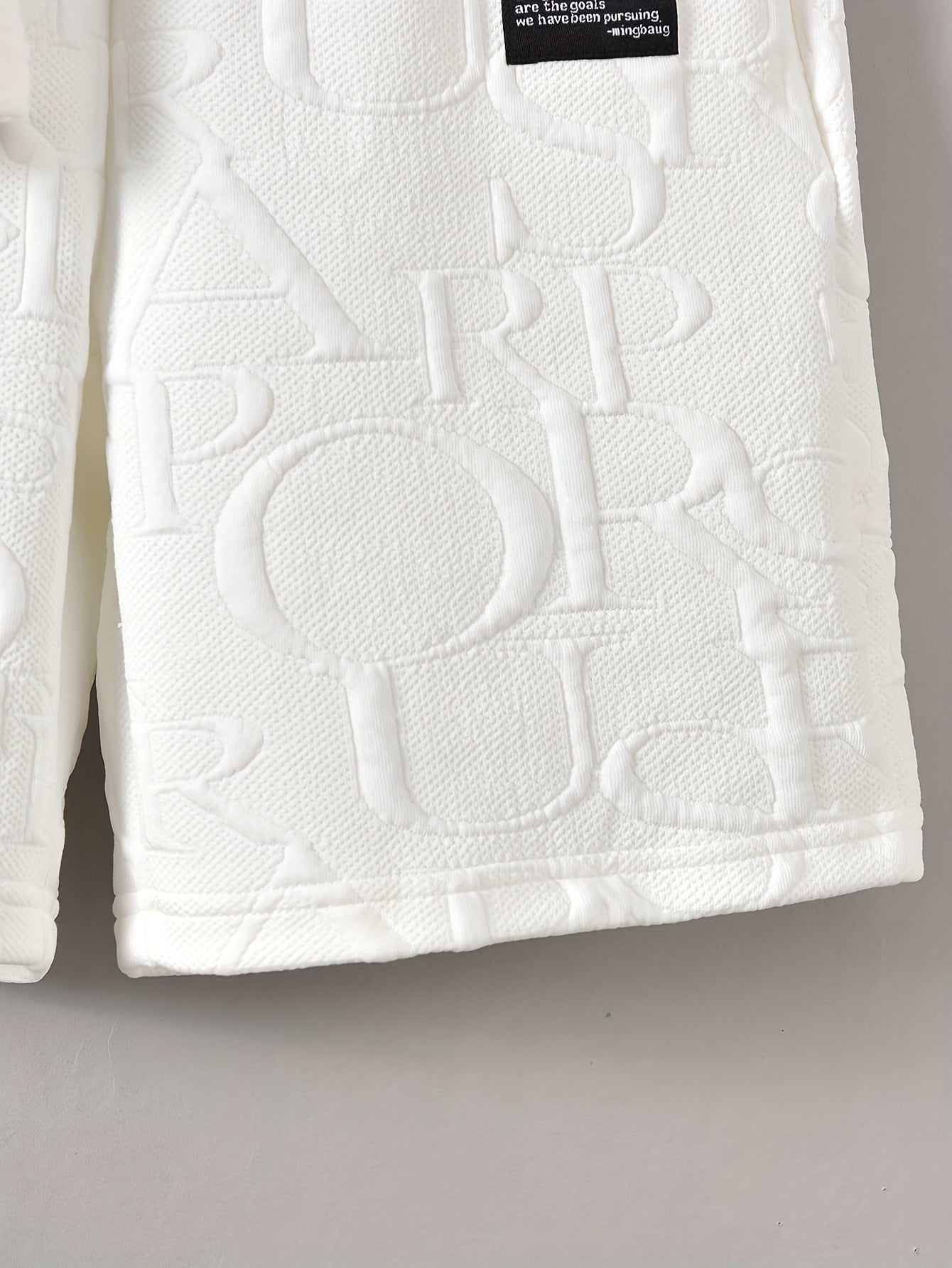 Conjunto de camiseta y pantalones cortos de verano con jacquard del alfabeto para niño