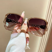 Women's Summer Sun Shades Large Oval Plastic Frame Glitter Jelly Fashion Glasses for Driving Beach
