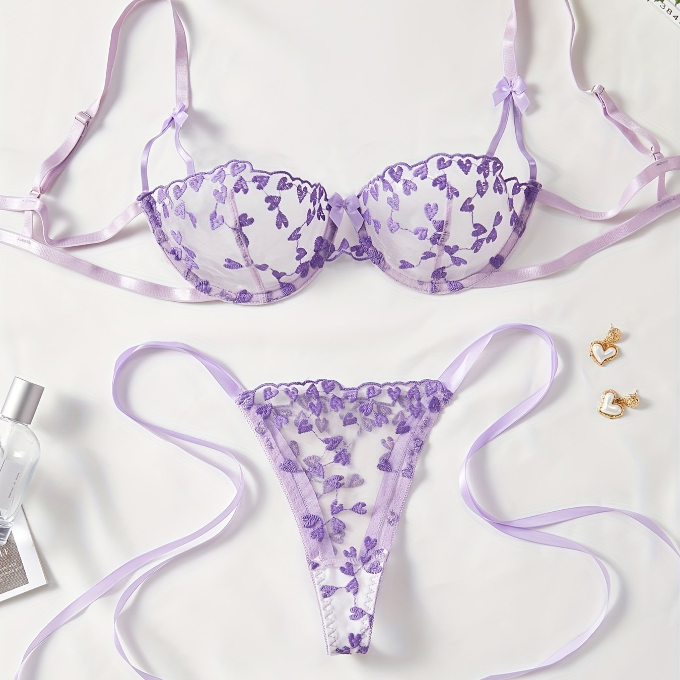 Conjunto de lencería de malla morada para mujer con bordado de corazón y decoración de lazo