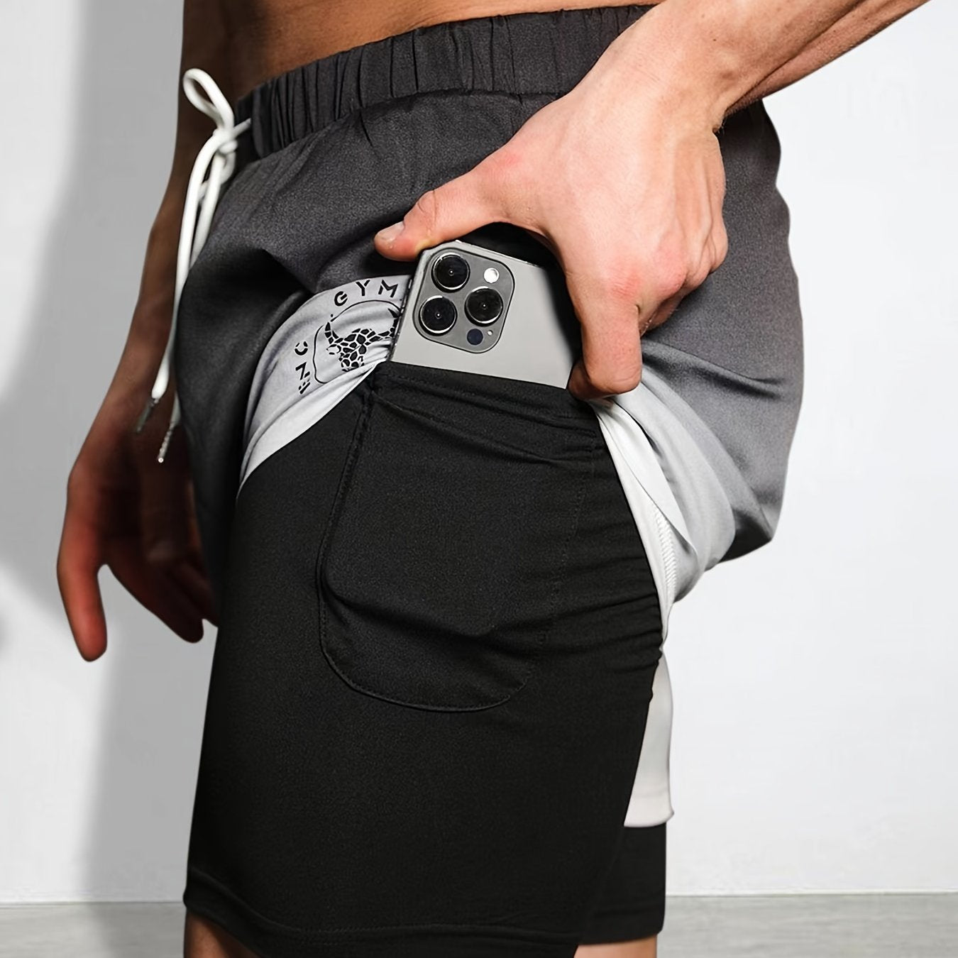 Yozgi sport zalida mashg'ulotlar uchun erkaklar uchun 2-in-1 ikki qatlamli sport shortlari