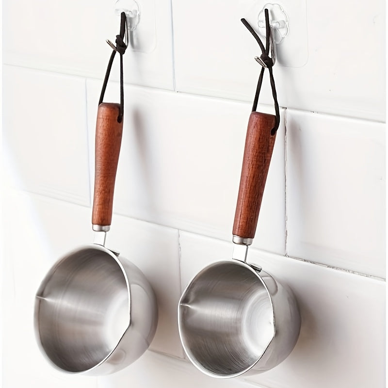 Stainless steel milk warmer with wooden handle for coffee and liquids