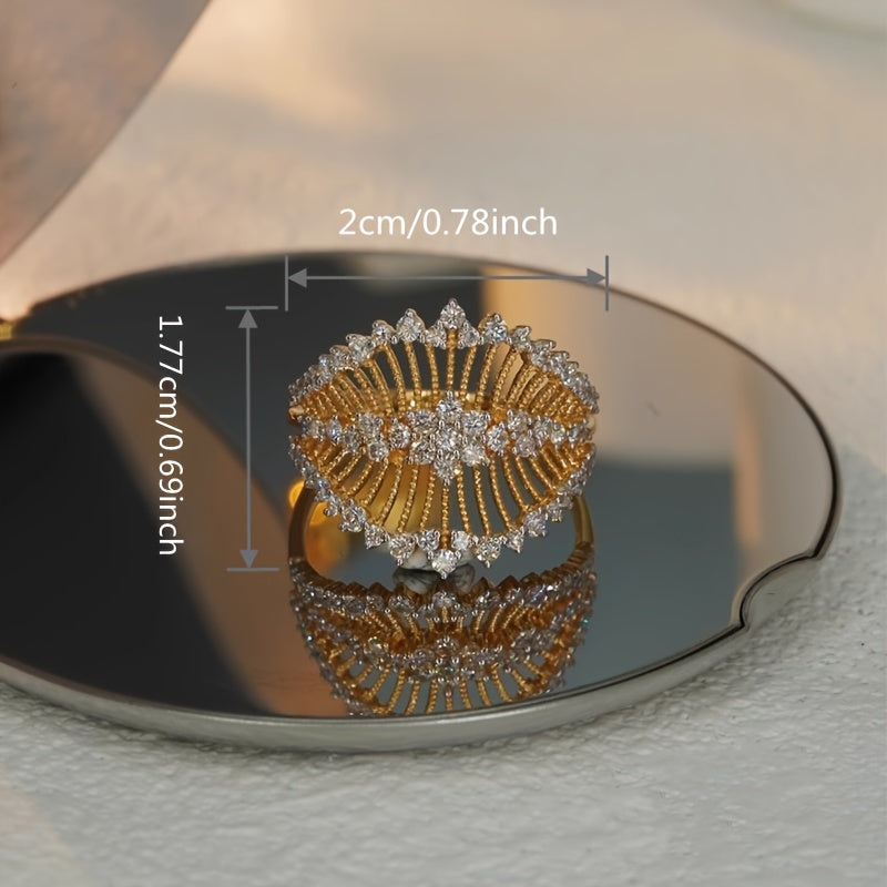 Chic keng halqalar, vintage uslubidagi dizayn va sintetik kubik zirkoniya inlay, mis asos, va 18K oltin qoplama bilan ayollar uchun - kundalik kiyim yoki maxsus tadbirlar uchun mukammal, har mavsum uchun abadiy uslub.