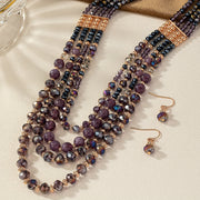 Zamonaviy va nafis, bu Purple Series Beaded Necklace Set uslub va noziklikni namoyish etadi. Bir nechta qatlamlardan iborat bo'lib, u to'plangan holda mukammal va har qanday ayolning zargarlik to'plamiga bir oz hashamat qo'shadi.