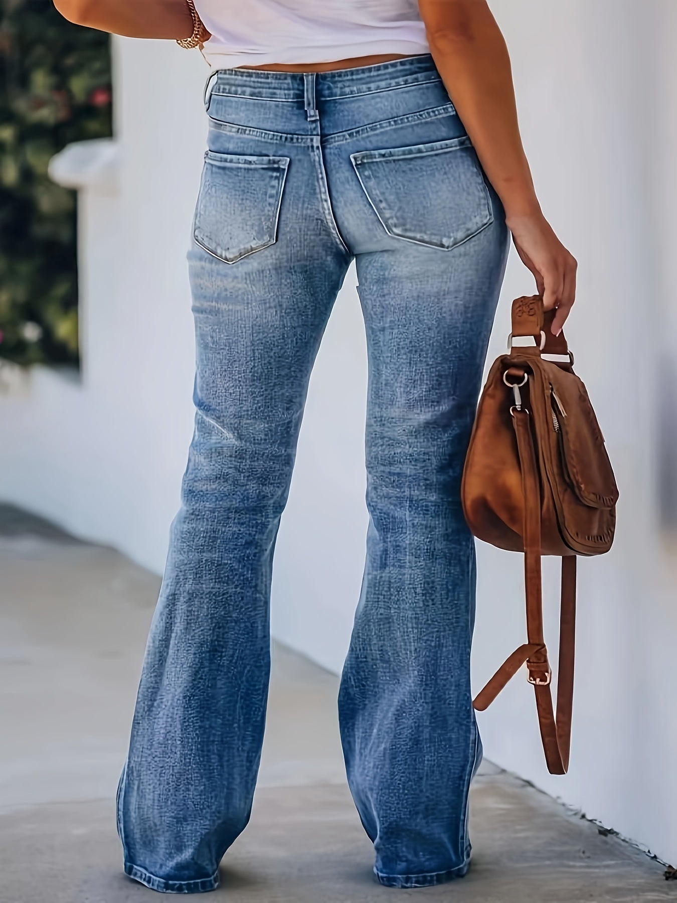 Jeans de mezclilla azul de corte acampanado para mujer talla grande con cierre de cremallera