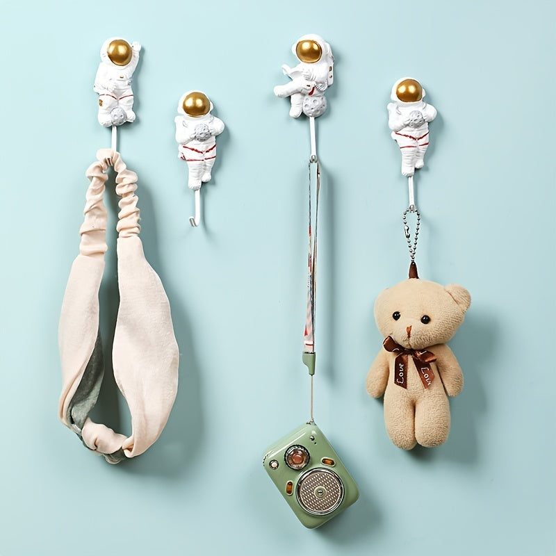 Ganchos de pared para cocina y puerta con diseño de astronauta adhesivo, fuerte y sin daños