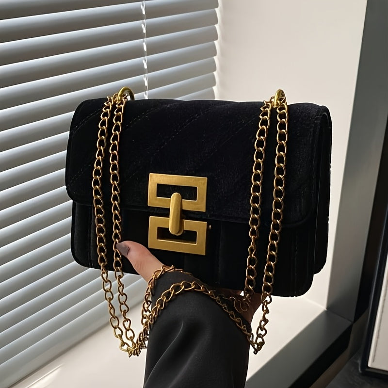 Ayollar uchun zanjirli belbog' va burama qulflanishi bilan bezatilgan elegant to'qilgan velur yelka sumkasi. Mustahkam rangli tuzilishga ega modalar aksessuar va polyester astar.