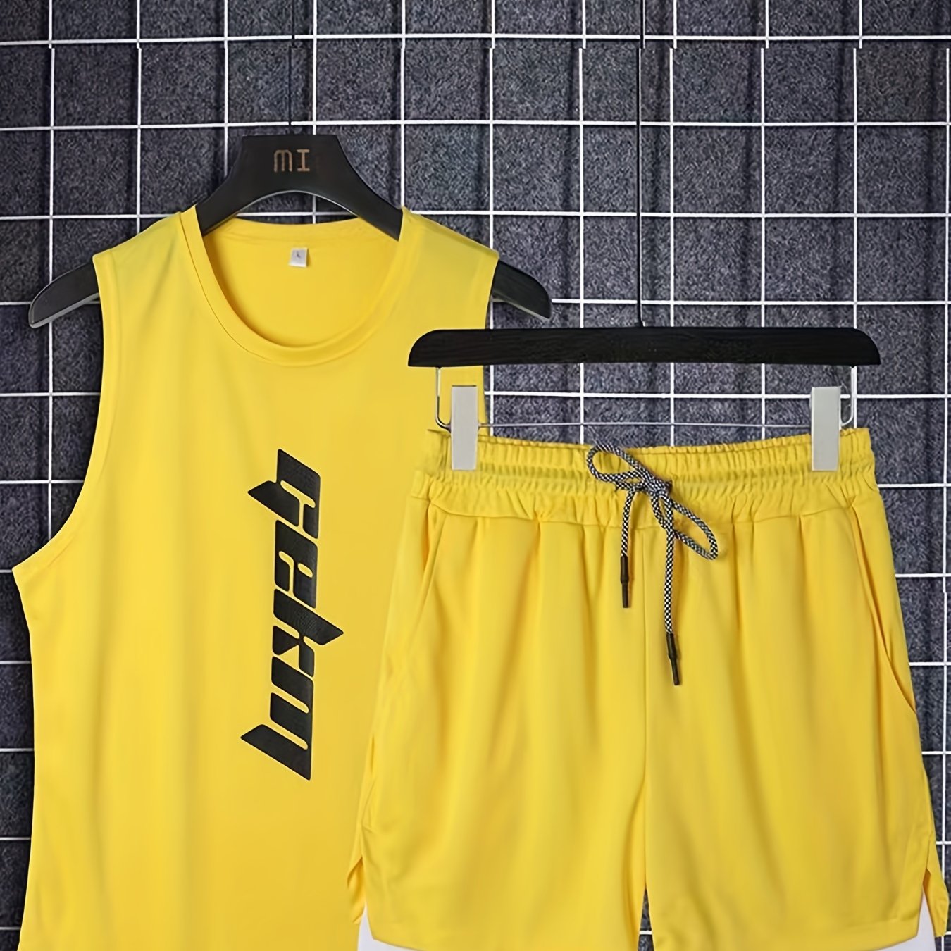 Conjunto deportivo de poliéster para hombre, camiseta sin mangas y pantalones cortos de baloncesto sueltos