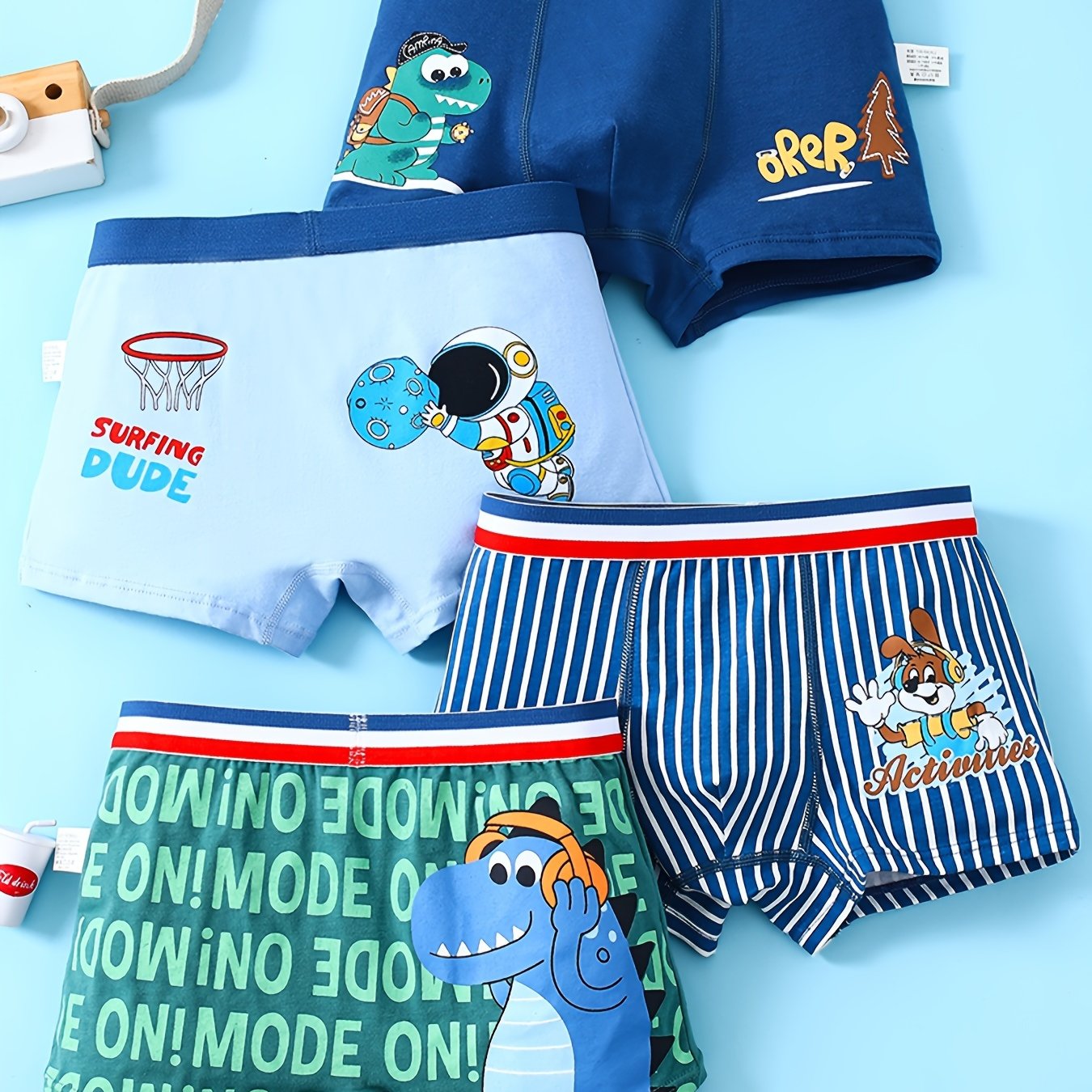 Conjunto de 4 calzoncillos bóxer de algodón para niños con estampados de astronauta y dinosaurio, transpirables, elásticos y aptos para todas las estaciones