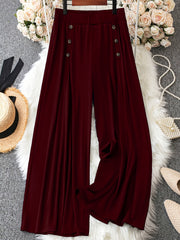 Plus-size ayollar uchun tugma tafsilotlari bilan bir xil rangli keng oyoq shimlar