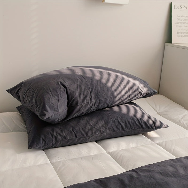 Yotoqxona uchun mo'ljallangan ikki rang-barang mustahkam polyester yostiq qoplamalari.