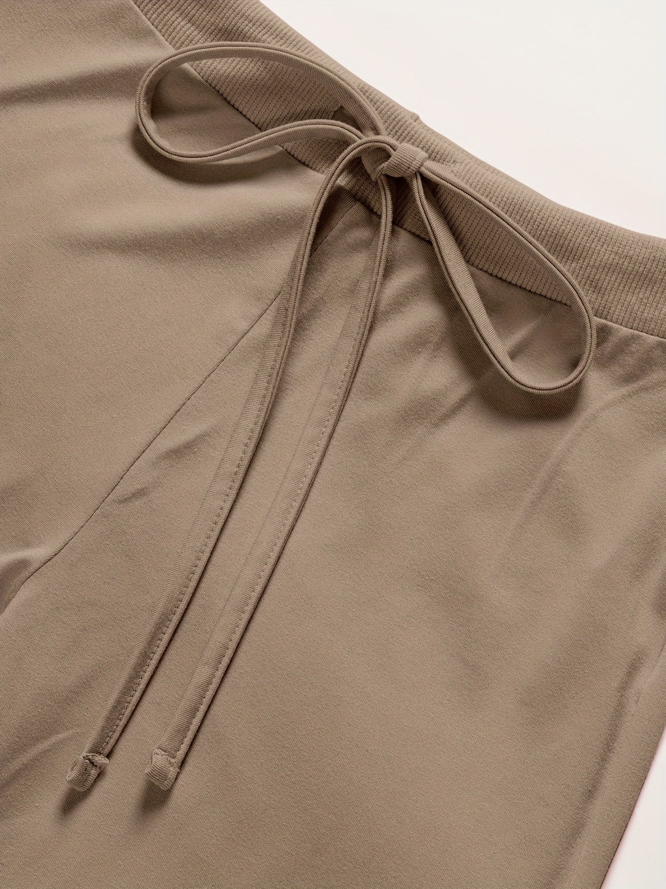 Conjunto de pijama de manga larga con ribetes y cinturilla ajustable para adultos, en tejido de punto de color sólido