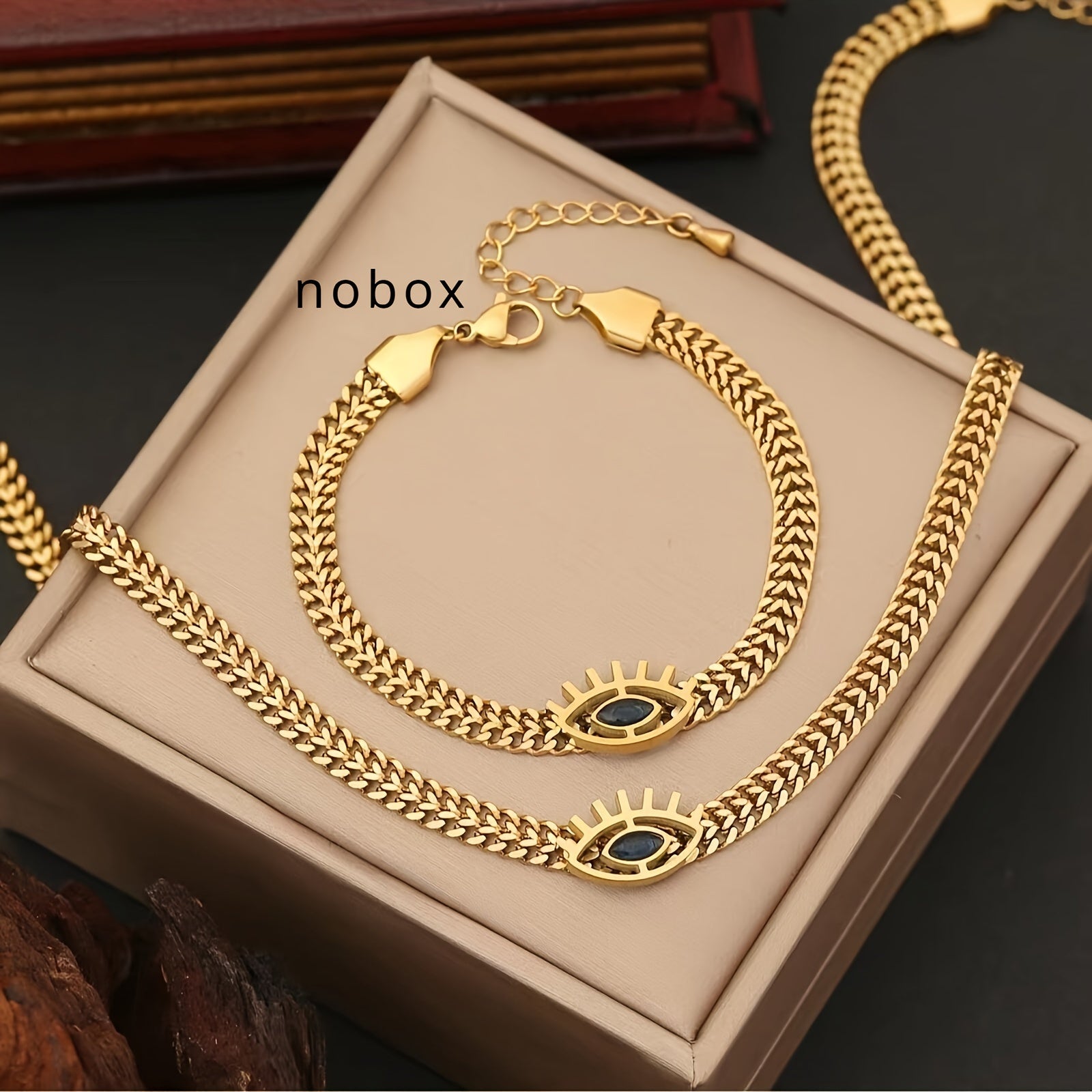 Golden Stainless Steel Hollow Eye Necklace and Bracelet Set for Women