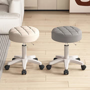 Black Adjustable Rolling Stool with Quilted Plastic Seat for Salon and Beauty Use