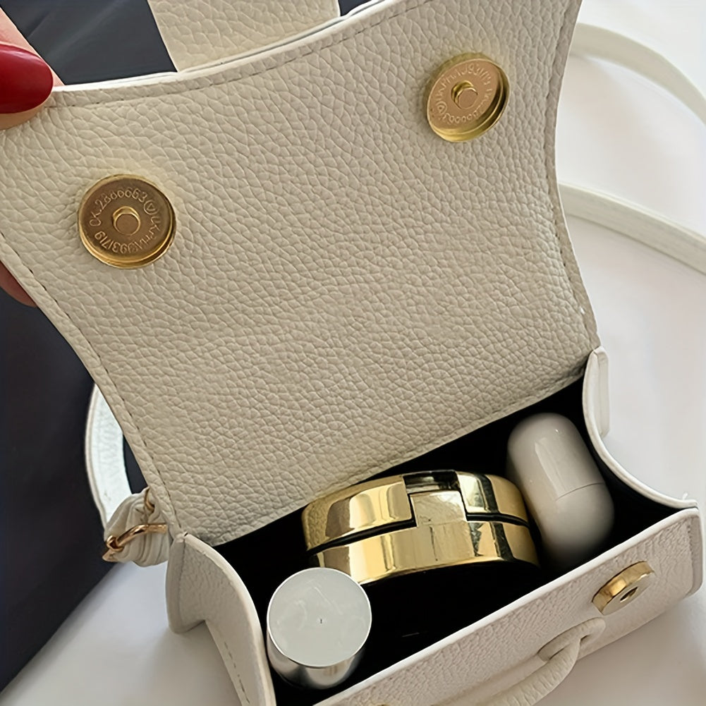 Zamonaviy niş dizayni, yuqori tutqichi va kvadrat shakli bilan uslubiy mini crossbody sumka.