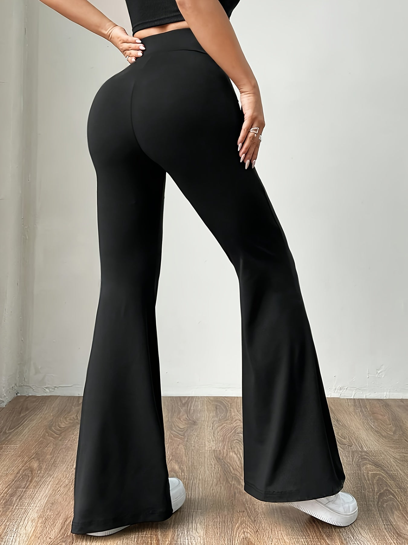 Pantalones de pierna acampanada de tiro alto para mujer con tela de punto elástico y control de abdomen