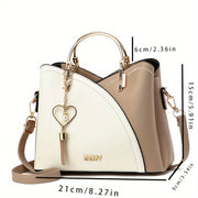 Onalar kuni sovg'asi: zamonaviy onalar uchun qarama-qarshi ranglarda uslubiy kichik yelka sumkasi, Pasxa uchun mukammal.