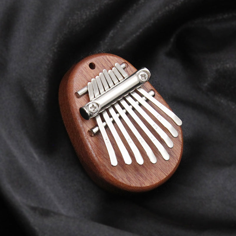 Mini Kalimba Thumb Piano for Beginners and Music Lovers Light Brown Wood 8 Keys Gift for Eid Al-Adha