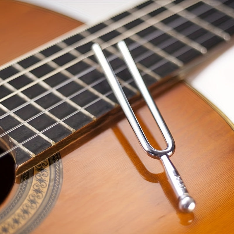 Eavnbaek 1 dona Standart A 440Hz Tuning Forks zanglamas po'latdan yasalgan, skripka, viola va gitara tuneri qurilmalari bilan mos keladi. DNKni tiklash davolash uchun, ovozga mos keladi.