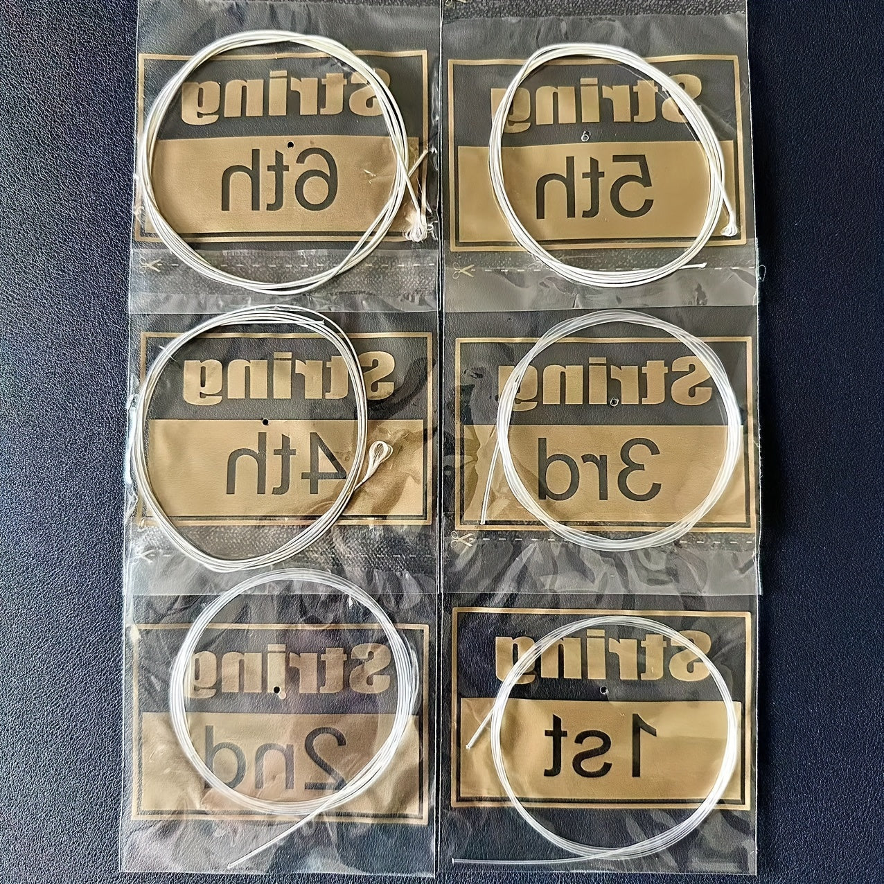 Cuerdas para guitarra clásica recubiertas de nylon con aleación de cobre plateada, juego de 6 cuerdas