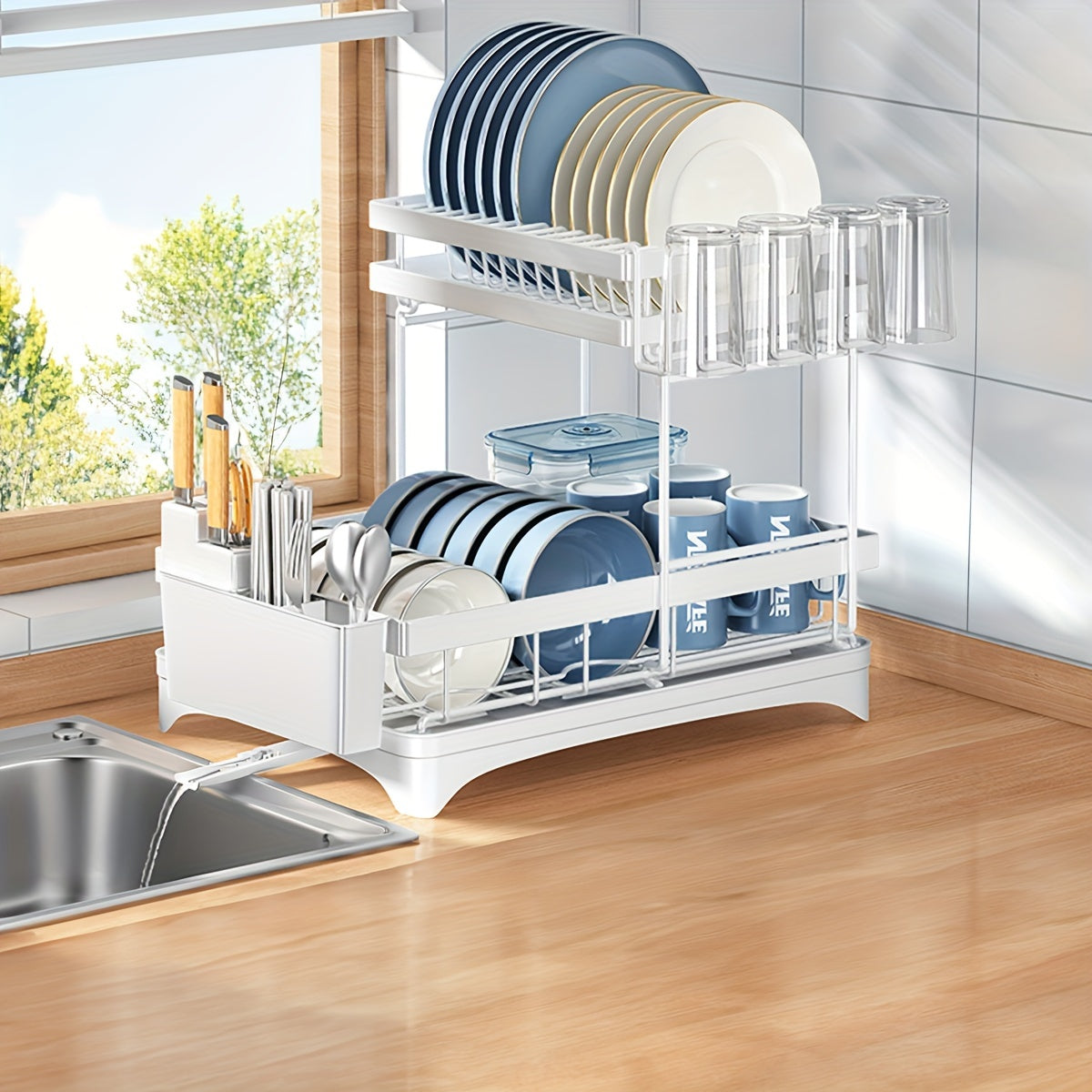 Qora ikki qatlamli ajraladigan oshxona suv chiqarish qismi, suv yo‘riqnomasi va idish tutgichlari bilan