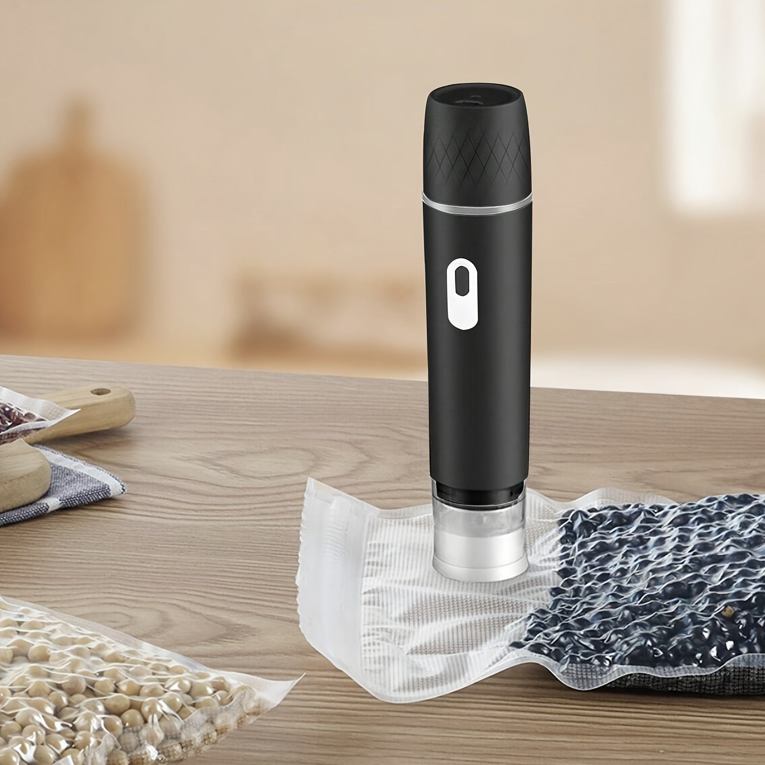 Qurilmaga ulangadigan litiy batareyali qo‘l bilan ishlatiladigan vakuum yopishtiruvchi, USB orqali zaryadlash, Sous Vide va yangi oziq-ovqat saqlash uchun portativ.