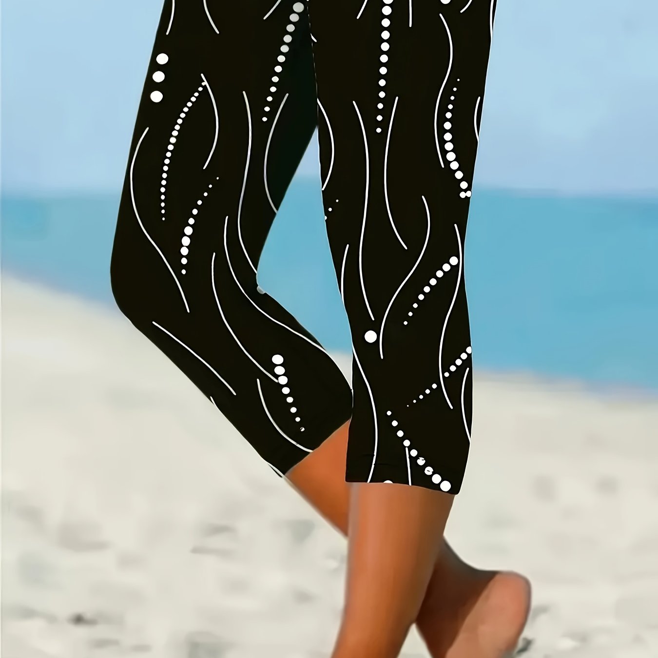 Women's Black and White Abstract Print Leggings with High Waist and Stretchy Fabric