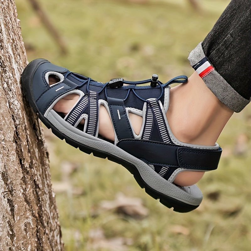 Barmoqni yopadigan erkaklar sandallari, tasmali, nafas oladigan, sirpanmaydigan kauchuk taglik, yozda plyaj va suv faoliyatlari uchun chidamli.