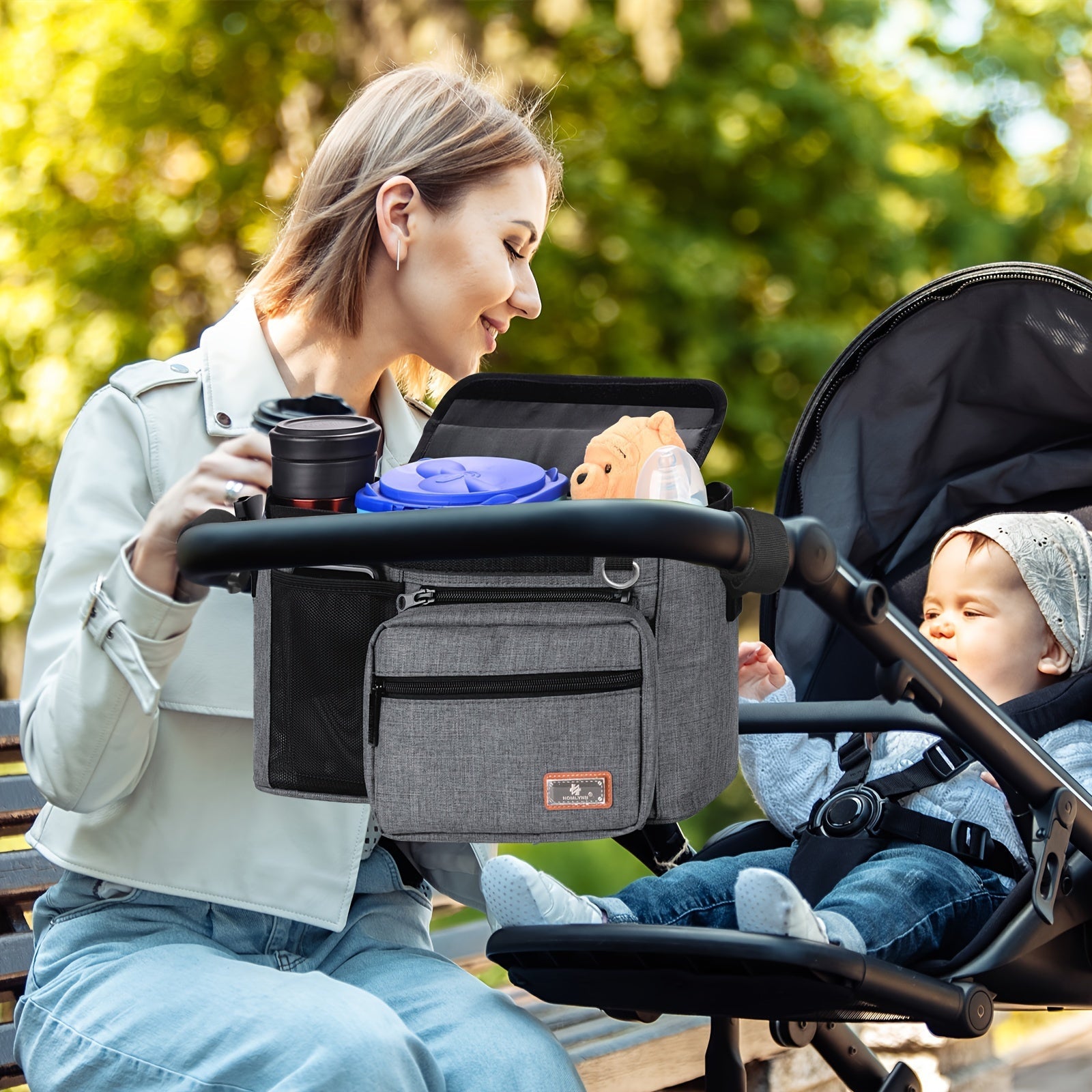 Ajratiladigan fermuarlı sumka, salfetkalar uchun joy, telefon cho'ntagi, shisha ushlagich va yelka tasmalari bilan aravachalar uchun tashkilotchisi - yuguruvchilar va aravacha qoplari uchun ideal, aksessuarlarni tartibga solish uchun mukammal.