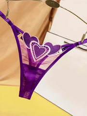 Ayollar uchun yurak naqshli thong ichki kiyim, moslashtiriladigan kattalashtirilgan o'lchamda, nafas oladigan to'r va jozibali to'qima bilan. Past bel, tungi klub uslubi, polyester materialda, S/M/L o'lchamlarida mavjud.