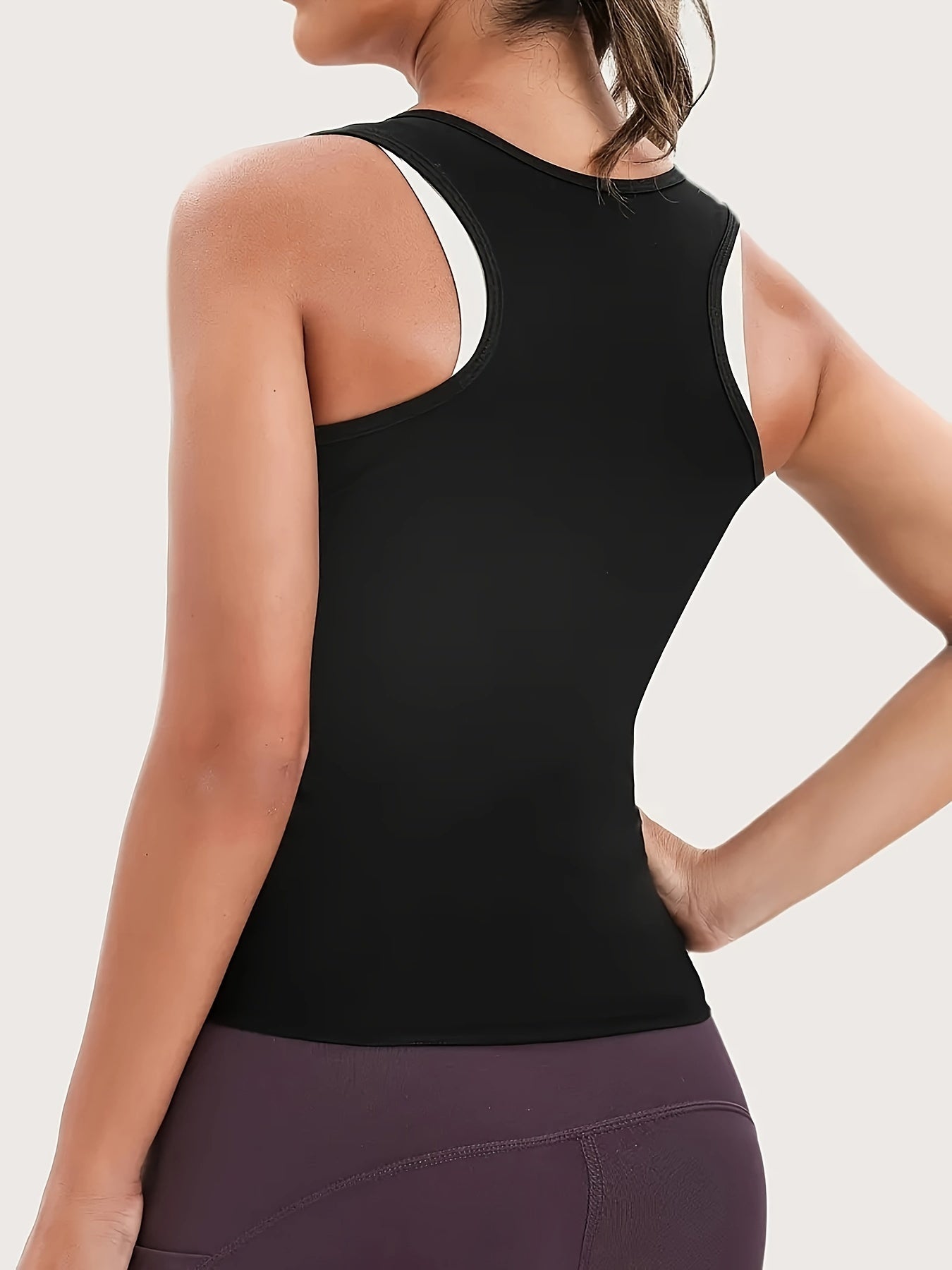 Women's Sleeveless Sports Tank Top with Sweat-Wicking Fabric and Tummy Control