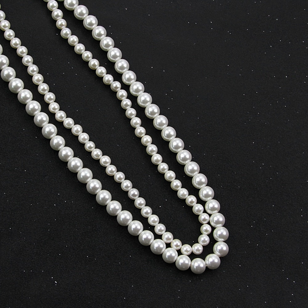 Women's Double Strand Shell Pearl Necklace with Zirconia Inlay and Infinite Clasp