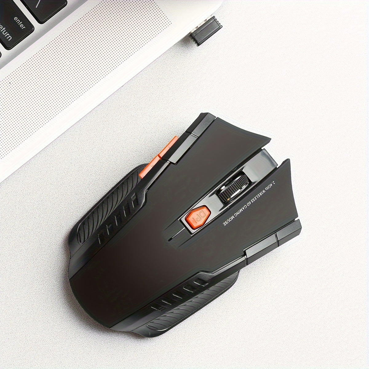 Ergonomik dizaynga ega portativ simsiz sichqoncha, o'yin va ofis ishlari uchun ideal.