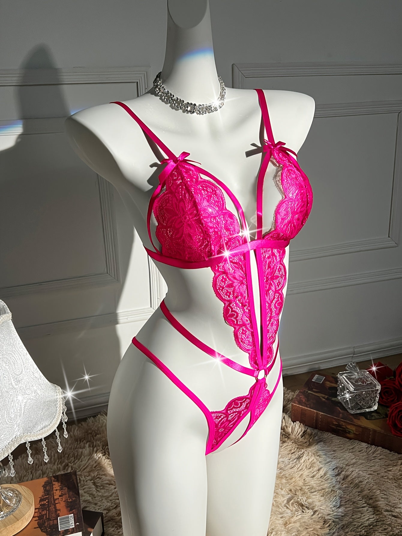 Women's Floral Lace Teddy Bodysuit with Open Crotch and Bow Details